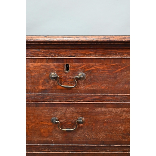 868 - A George III cross-banded oak chest of two short over three long graduated drawers, raised on shaped... 