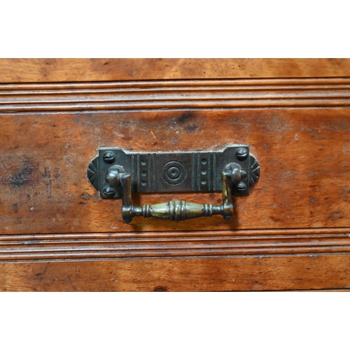 869 - A late 19th century walnut book press chest, the brass bound nautical style adjusting wheel over thr... 