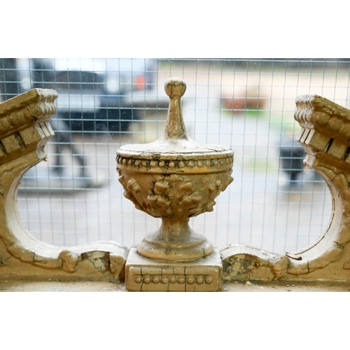 873 - A Georgian Adam style over mantel mirror, the broken arched pediment centred by an urn over Arabic a... 