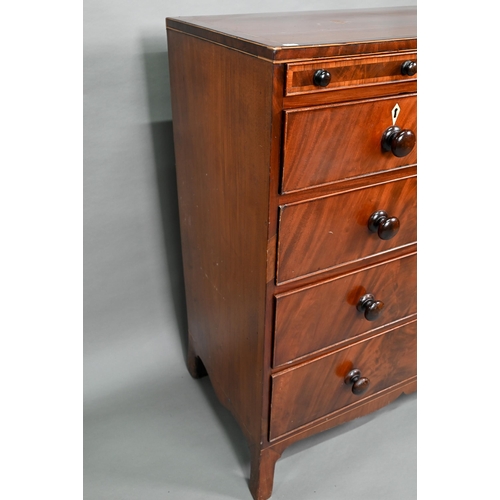 875 - A Victorian mahogany chest of three shallow drawers over two short and three long graduated drawers,... 