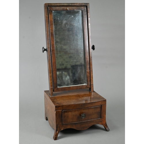 876 - A compact 19th century mahogany toilet mirror, raised on a single bow-fronted drawer base, on splaye... 