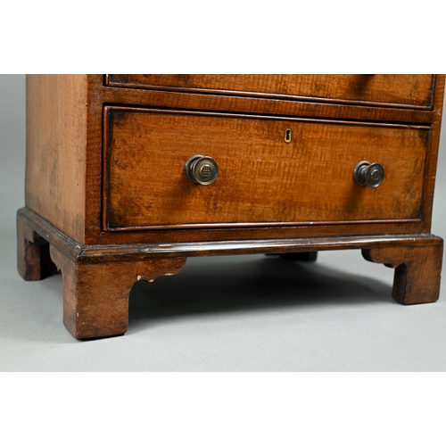 879 - A late 19th century miniature mahogany chest of two short over two long graduated with metal pulls, ... 