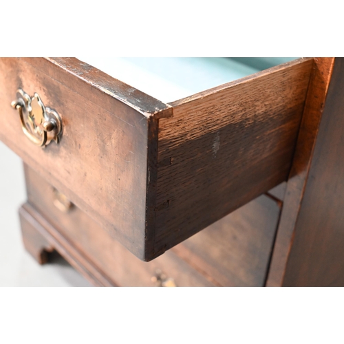 882 - A diminutive Georgian style cross-banded walnut bureau bookcase, the arched astragal glazed cabinet ... 