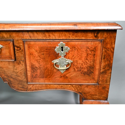 887 - A Georgian style cross and feather-banded quarter veneered walnut side table with three drawers with... 