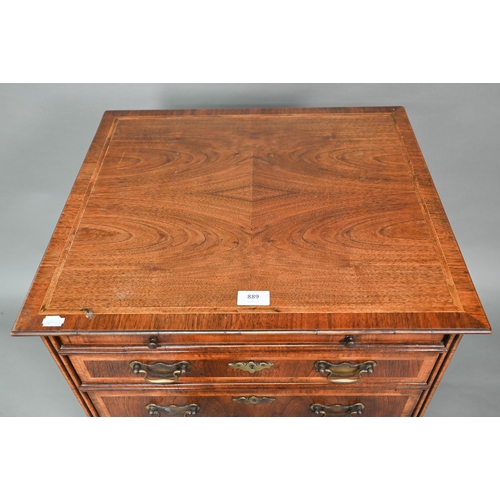 889 - A well executed Georgian style small cross and feather-banded walnut chest of four drawers beneath a... 