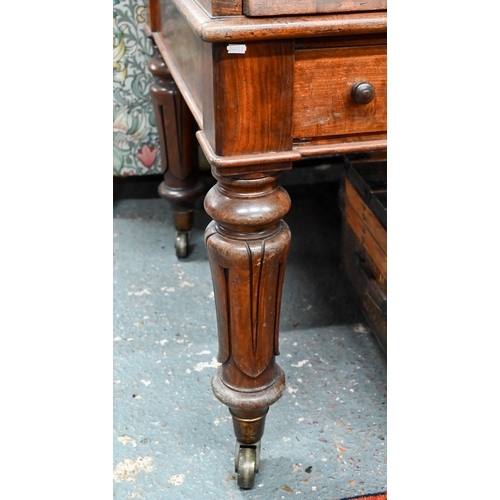 891 - A William VI mahogany cylinder top desk, the 3/4 gallery top over a leather top slide and stationary... 