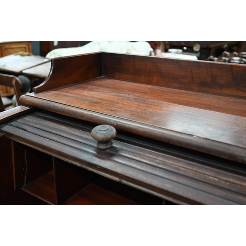 891 - A William VI mahogany cylinder top desk, the 3/4 gallery top over a leather top slide and stationary... 