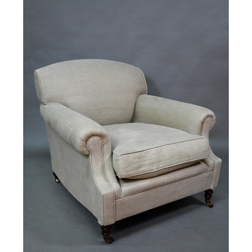 George Smith, a pair of contemporary oatmeal linen upholstered deep easy armchairs in the Howard style, with feather seat cushions, raised on turned front legs and castors, 110 cm w x 92 cm x 94 cm h (the seats 75 cm deep) (2)