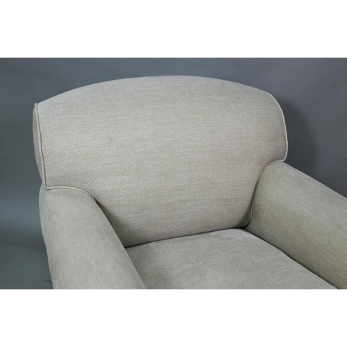 895 - George Smith, a pair of contemporary oatmeal linen upholstered deep easy armchairs in the Howard sty... 