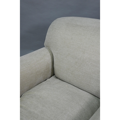 895 - George Smith, a pair of contemporary oatmeal linen upholstered deep easy armchairs in the Howard sty... 