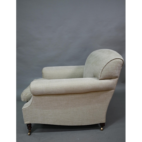 895 - George Smith, a pair of contemporary oatmeal linen upholstered deep easy armchairs in the Howard sty... 