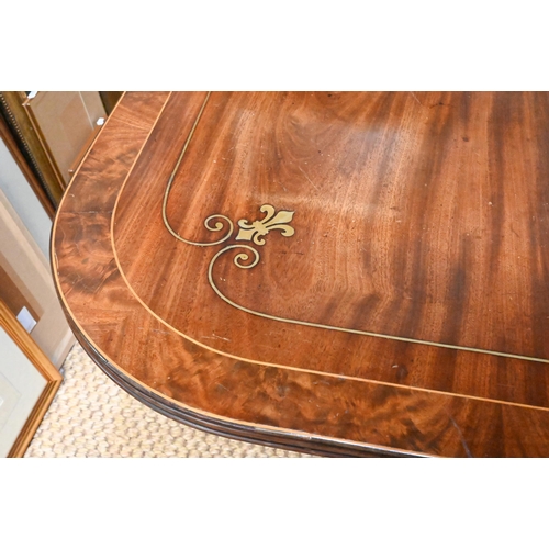 896 - A Victorian brass inlaid mahogany breakfast table, the rectangular top with rounded corners, raised ... 