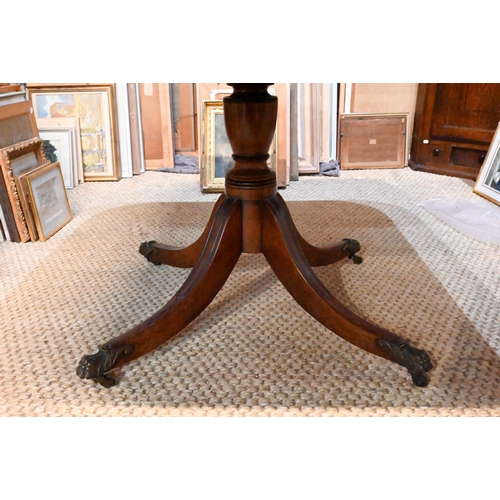 896 - A Victorian brass inlaid mahogany breakfast table, the rectangular top with rounded corners, raised ... 