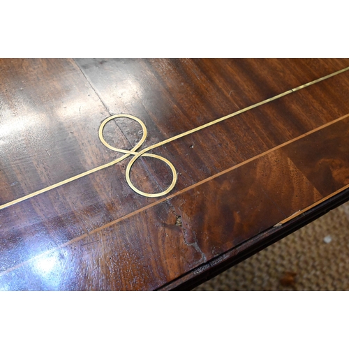 896 - A Victorian brass inlaid mahogany breakfast table, the rectangular top with rounded corners, raised ... 