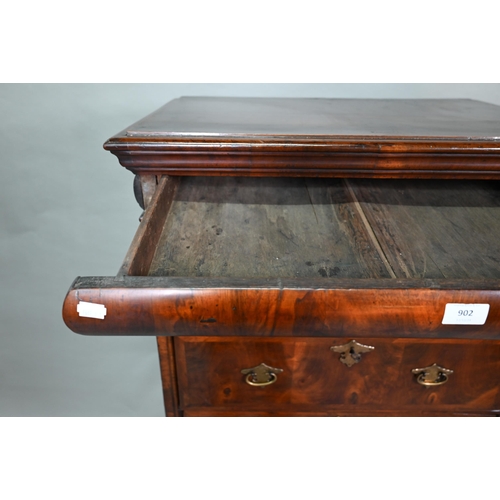 902 - A Queen Anne period and later altered feather banded walnut chest on stand, the moulded cornice over... 