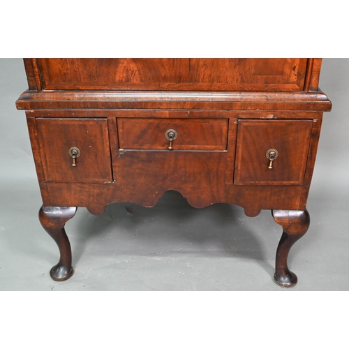 902 - A Queen Anne period and later altered feather banded walnut chest on stand, the moulded cornice over... 