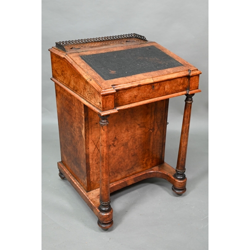 909 - A Victorian inlaid figured walnut Davenport, the pierced brass 3/4 gallery slope top with pair of gl... 