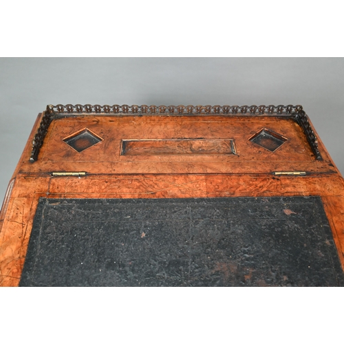 909 - A Victorian inlaid figured walnut Davenport, the pierced brass 3/4 gallery slope top with pair of gl... 