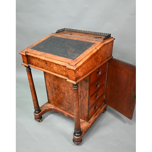 909 - A Victorian inlaid figured walnut Davenport, the pierced brass 3/4 gallery slope top with pair of gl... 