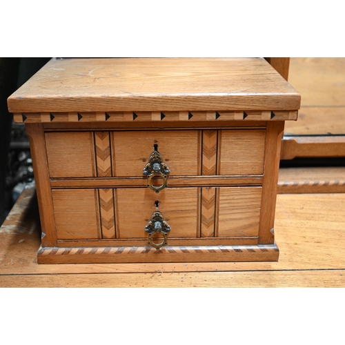 910 - A close matched Arts & Crafts Gothic Reform inlaid Ash four part bedroom suite in the manner of ... 