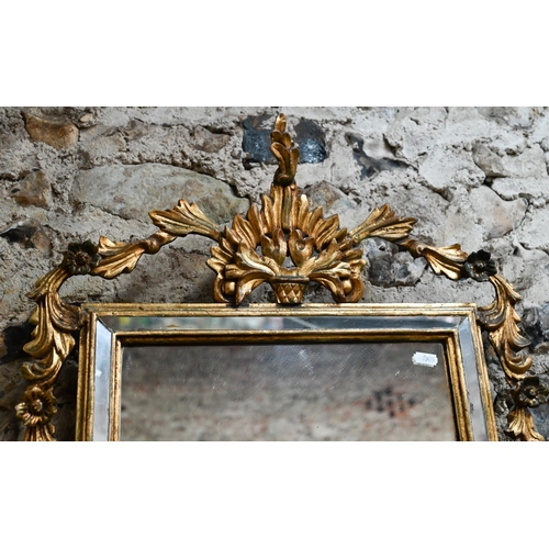 913 - A 19th century Italian gilt framed cushion mirror edged wall mirror, 93 cm h x 51 cm w