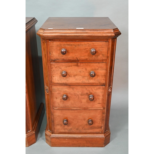 915 - A pair of Victorian mahogany four drawer pedestals, with twin turned knobs and canted corners, 46 cm... 