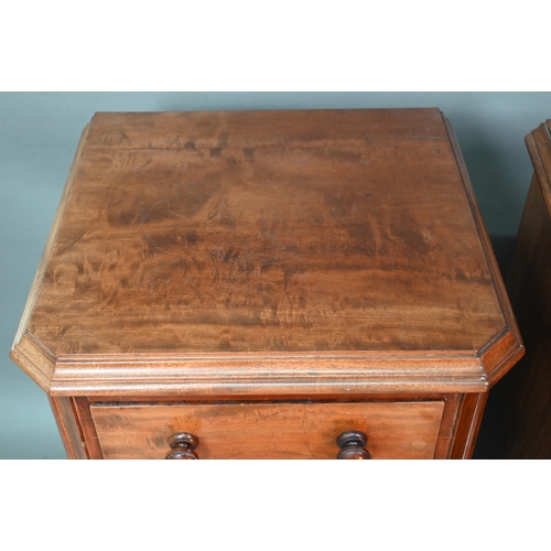 915 - A pair of Victorian mahogany four drawer pedestals, with twin turned knobs and canted corners, 46 cm... 