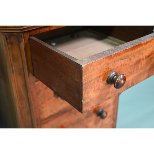 915 - A pair of Victorian mahogany four drawer pedestals, with twin turned knobs and canted corners, 46 cm... 