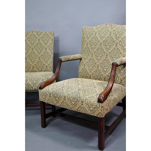 918 - An old hump back Gainsborough elbow chair, re-upholstered in green fabric and raised on moulded squa... 