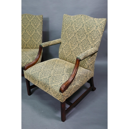 918 - An old hump back Gainsborough elbow chair, re-upholstered in green fabric and raised on moulded squa... 