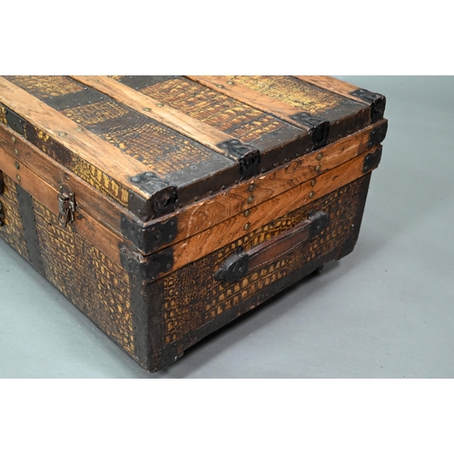 920 - A vintage steel and wood bound crocodile skin panelled trunk, with leather carrying handles, 92 cm w... 