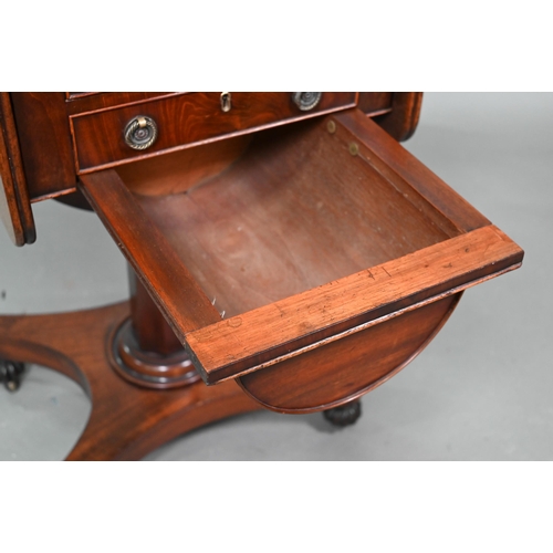 941 - A Victorian mahogany drop leaf two-drawer work table, dummy drawer fronts to verso, with domed stora... 