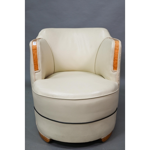 943 - A 1930s Art Deco cream leather and birds eye maple panelled tub chair