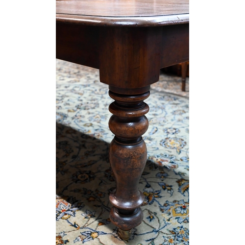 944 - An early Victorian mahogany draw leaf dining table, with single insert leaf, the top with moulded ed... 