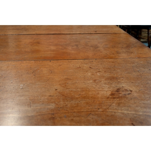 944 - An early Victorian mahogany draw leaf dining table, with single insert leaf, the top with moulded ed... 