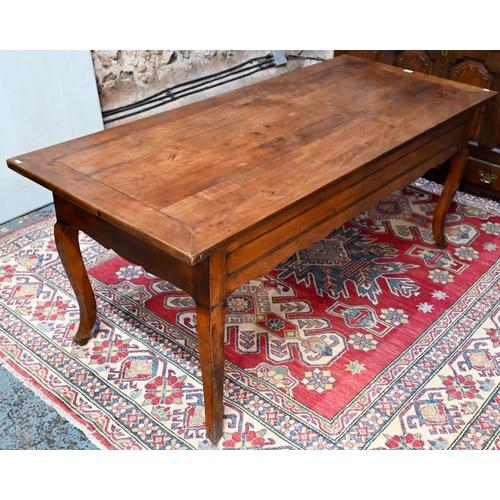 947 - A French fruitwood table, 19th century, the mitre framed rectangular top sliding to reveal a deep st... 