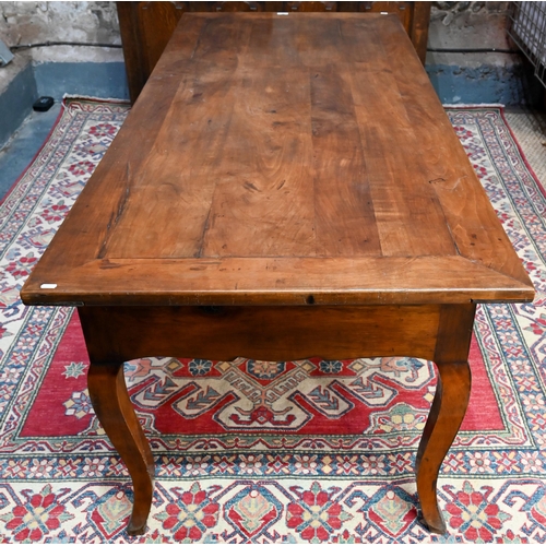 947 - A French fruitwood table, 19th century, the mitre framed rectangular top sliding to reveal a deep st... 