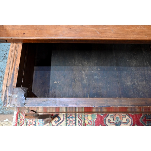 947 - A French fruitwood table, 19th century, the mitre framed rectangular top sliding to reveal a deep st... 