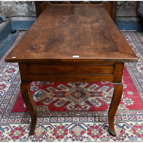 947 - A French fruitwood table, 19th century, the mitre framed rectangular top sliding to reveal a deep st... 