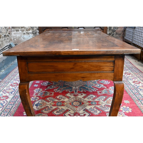 947 - A French fruitwood table, 19th century, the mitre framed rectangular top sliding to reveal a deep st... 