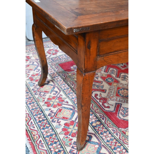 947 - A French fruitwood table, 19th century, the mitre framed rectangular top sliding to reveal a deep st... 