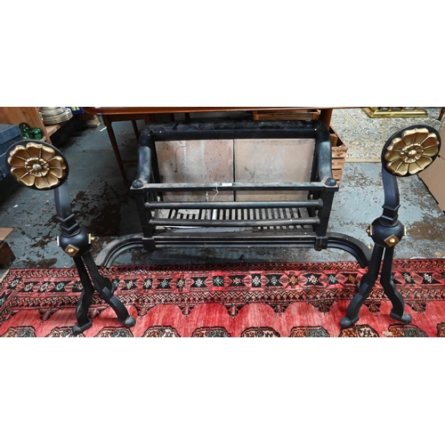 951 - A large substantial Arts & Crafts style fire basket, brass mounted, the integral brick fireback ... 