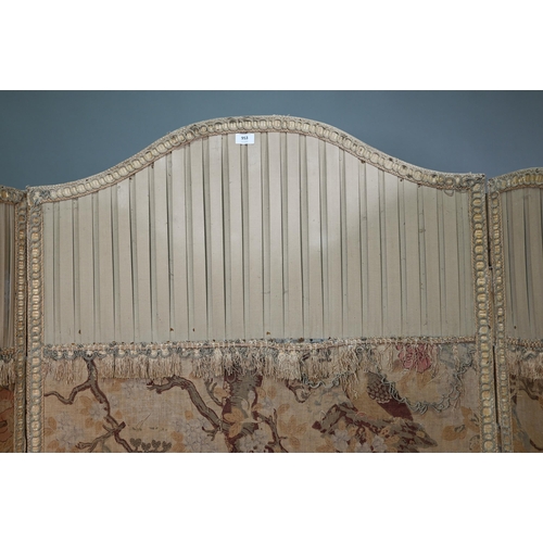 953 - A late 19th century fabric panelled three fold arched dressing screen, at fault