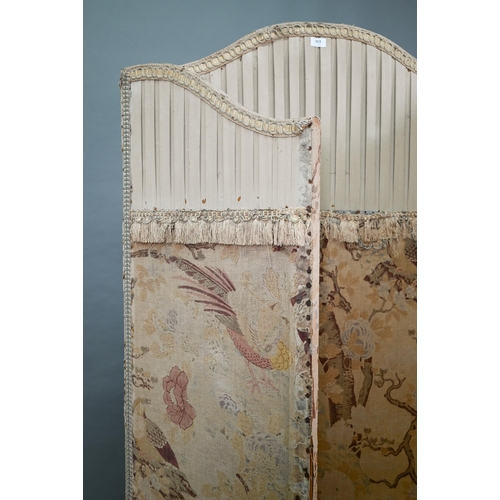 953 - A late 19th century fabric panelled three fold arched dressing screen, at fault