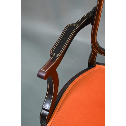 954 - An Edwardian ivorine and boxwood inlaid Sheraton Revival salon open armchair, with later orange fabr... 