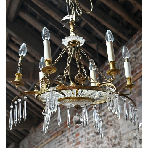 958 - A vintage six-branch gilt framed chandelier, of oval form, crustal hung, suspended from link chain t... 