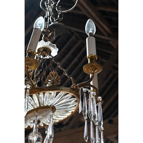 958 - A vintage six-branch gilt framed chandelier, of oval form, crustal hung, suspended from link chain t... 