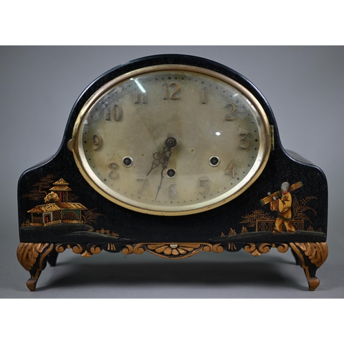 966 - An early 20th century chinoiserie cased black and gilt lacquered mantel clock with continental three... 