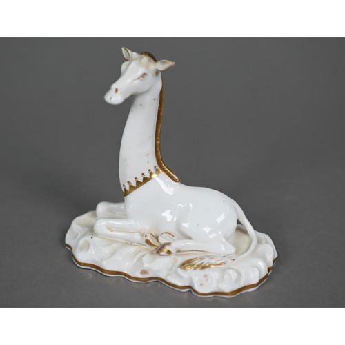 599A - A Victorian china seated giraffe, in the manner of Grainger's Worcester, on naturalistic base, 11.5 ... 