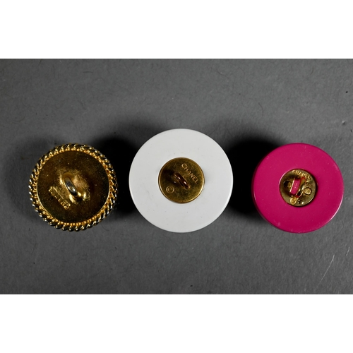 1279 - Chanel - Three sets of buttons - eight gilt metal, nine pink with 'CC' motif and twelve white, all s... 